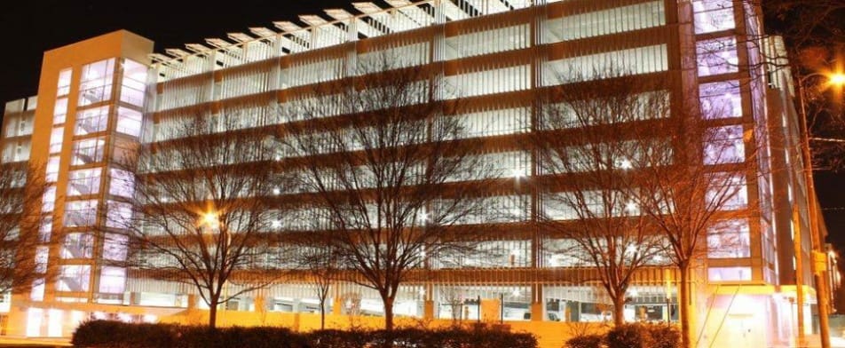 A building with lights on the outside of it